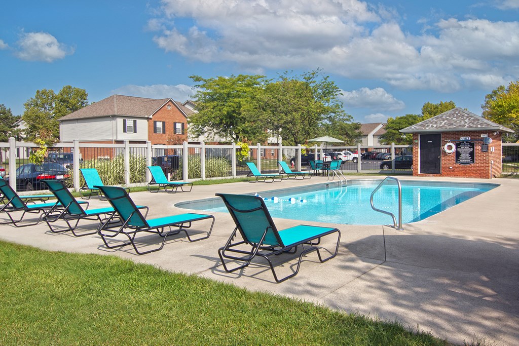 our apartments offer a swimming pool with chaise lounge chairs