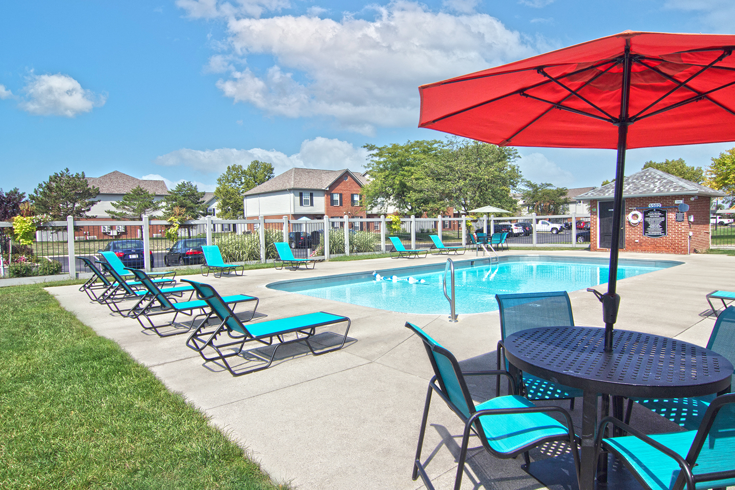 our apartments offer a swimming pool with chairs and umbrellas