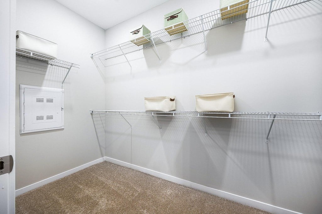 Empty shelves in a white room.