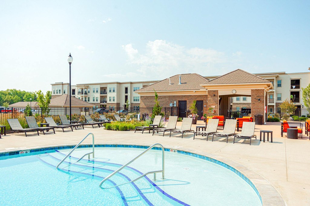 our apartments offer a swimming pool with chaise lounge chairs