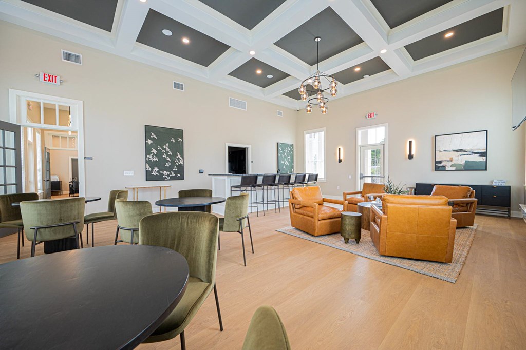 A room with a table and chairs.