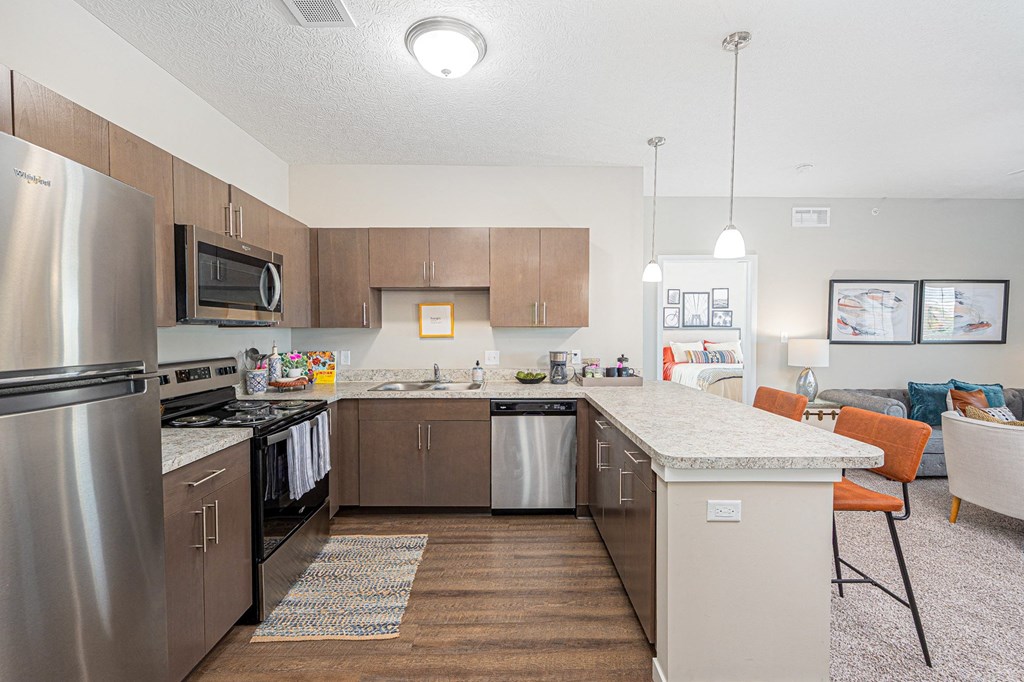 our spacious kitchens are equipped with stainless steel appliances and granite counter tops