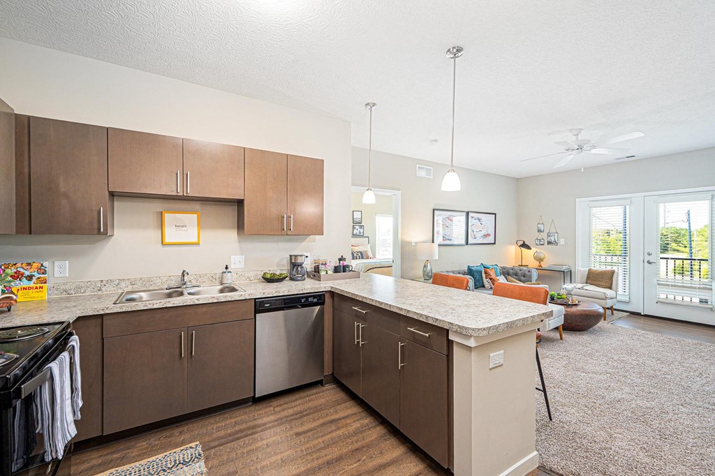 a kitchen with a counter top and a sink