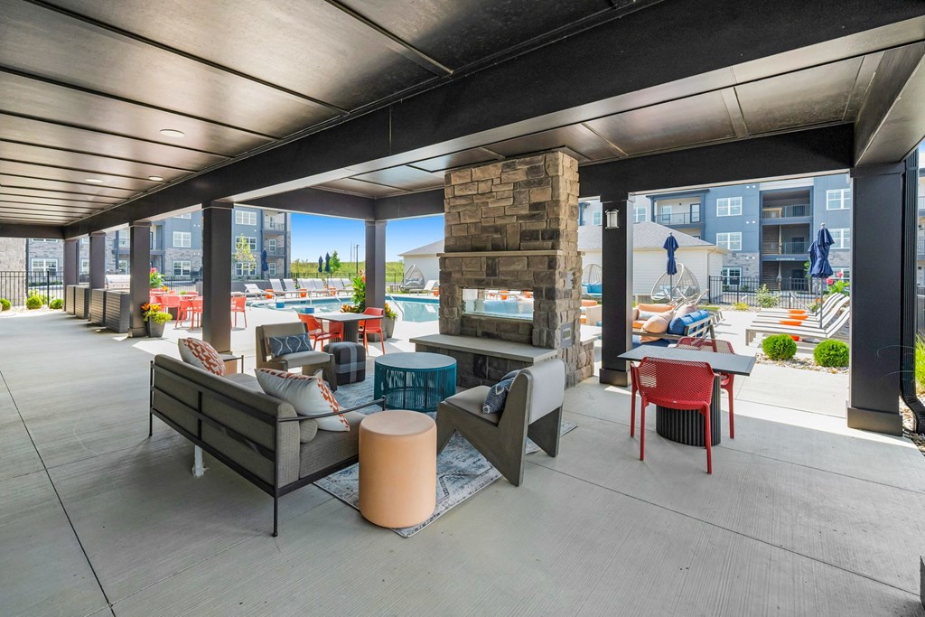 A patio with a table and chairs is shown.