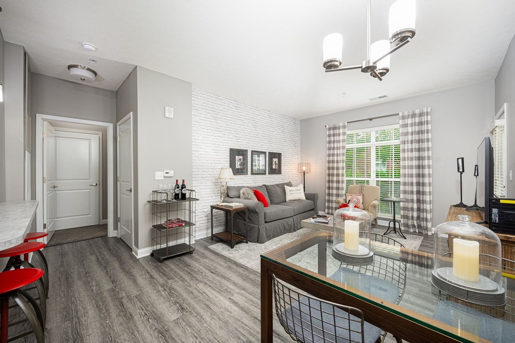 a living room with couches and a table