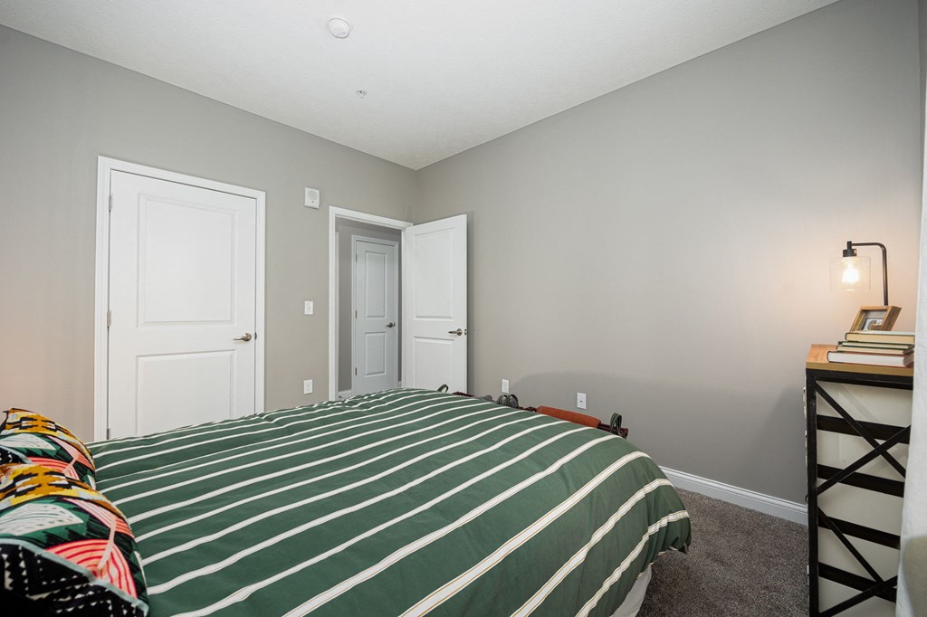 a bedroom with a bed