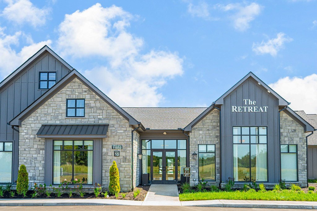 A building with the word "Retreat" on the front.
