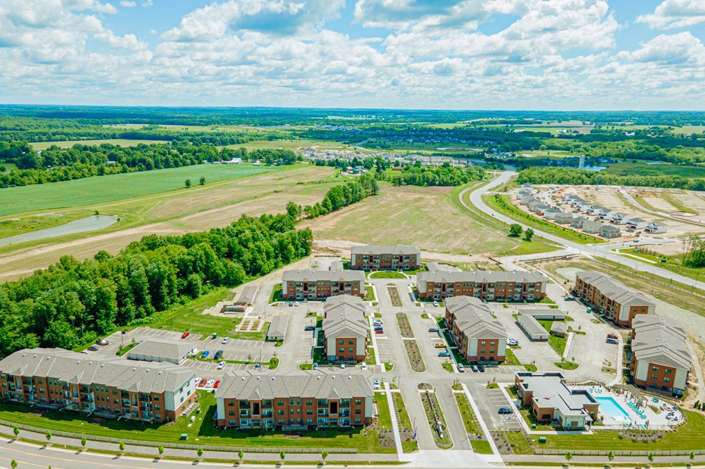 an aerial view of a building and an airport