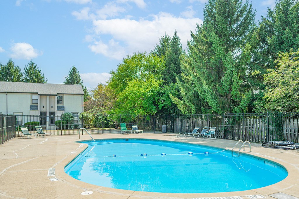 our apartments have a resort style pool with trees