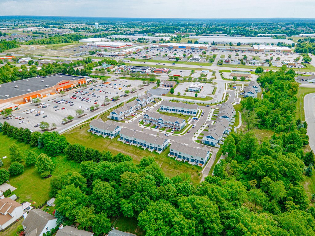 an aerial view of a parking lot in a city