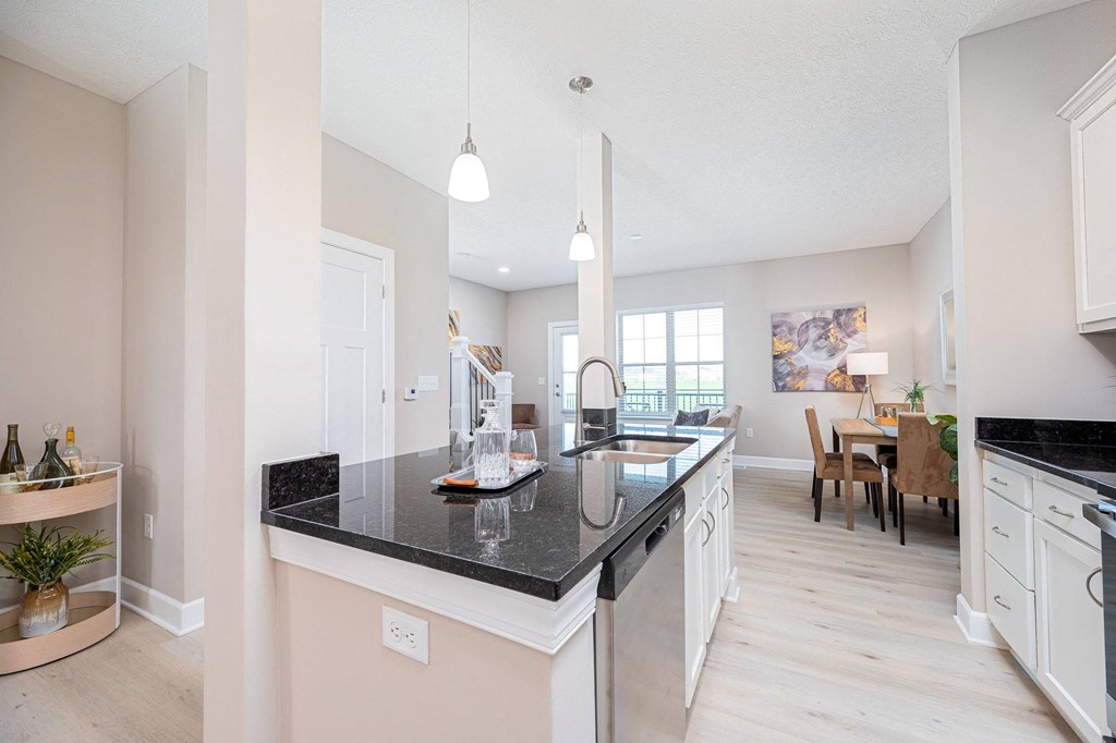 a kitchen with a sink and a counter top