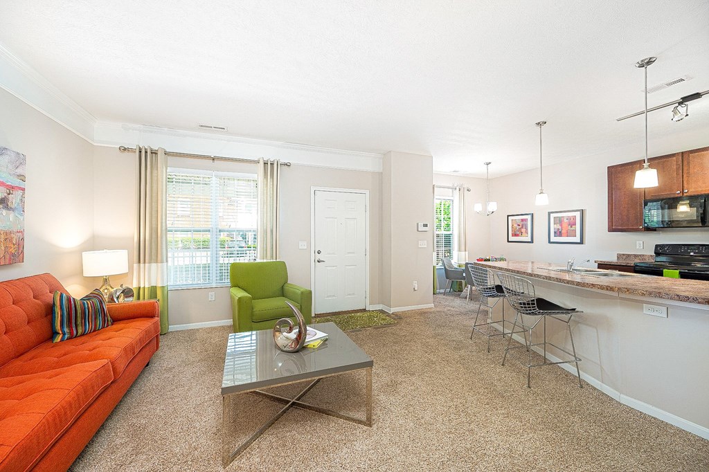 a living room with an orange couch
