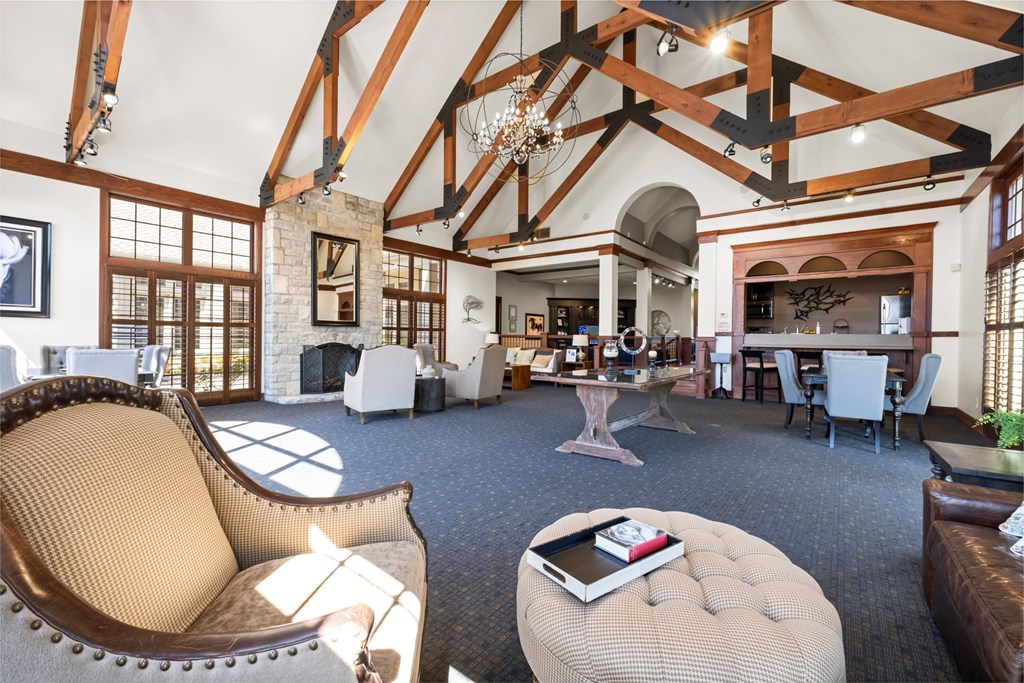 A large room with a high ceiling and wooden beams.