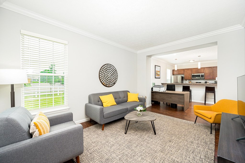 a living room with couches and a table