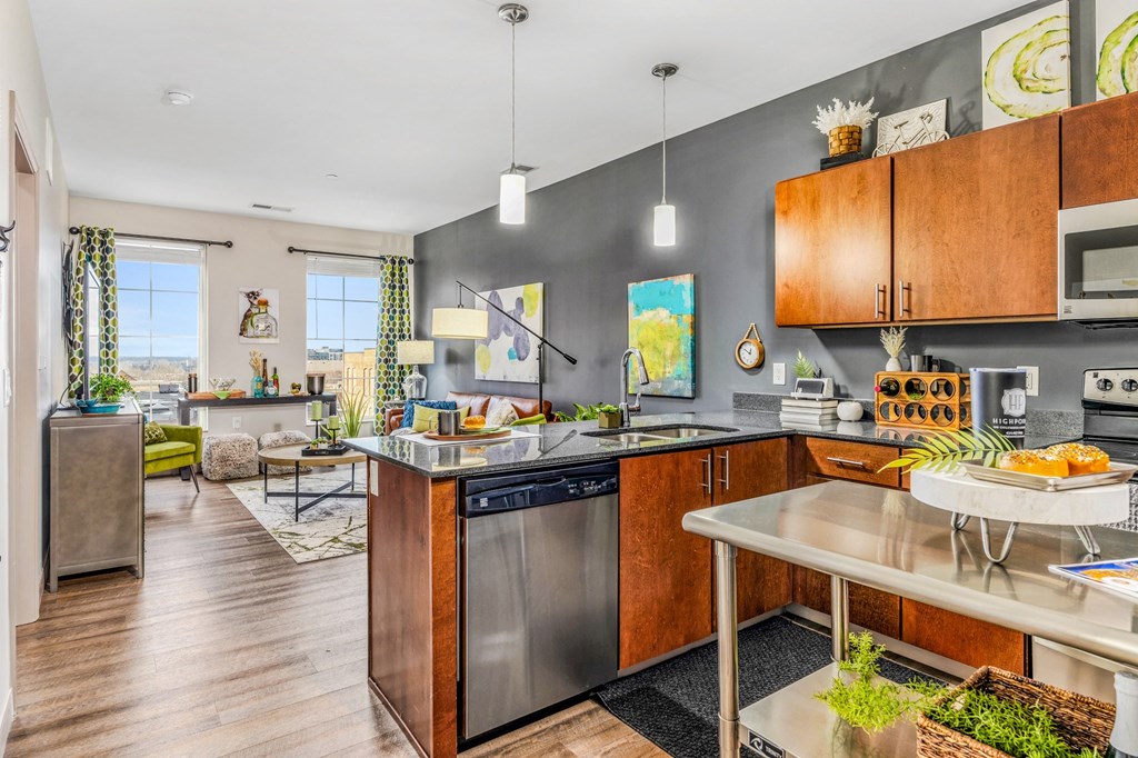 a kitchen with stainless steel appliances and a counter top
