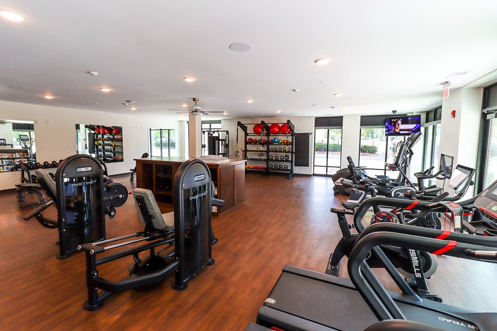 a room filled with lots of different types of exercise equipment