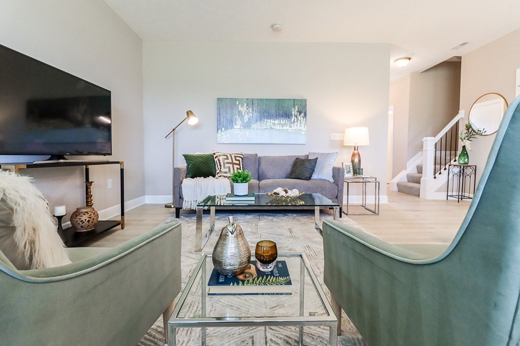 a living room with two couches and a coffee table