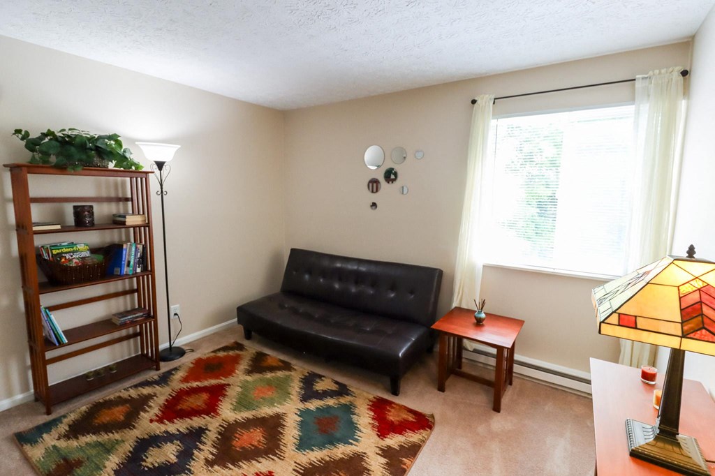 a living room with a couch and a coffee table
