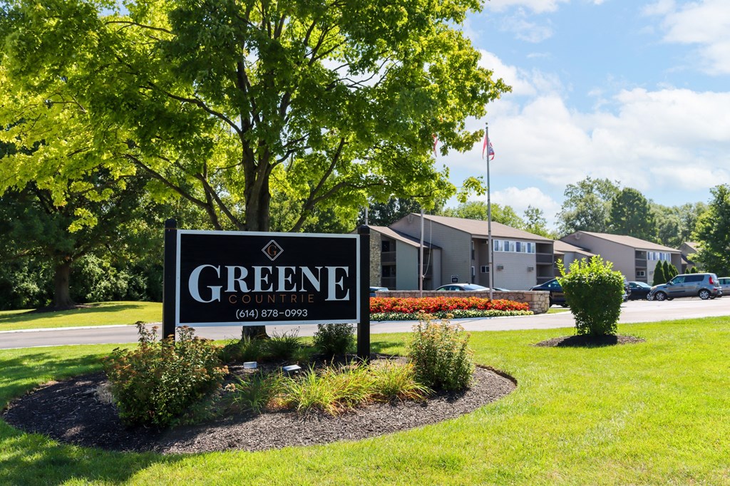 the sign in front of greene country club