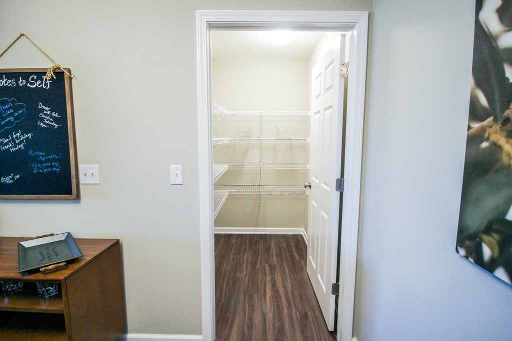 a walk in closet in a 555 waverly unit