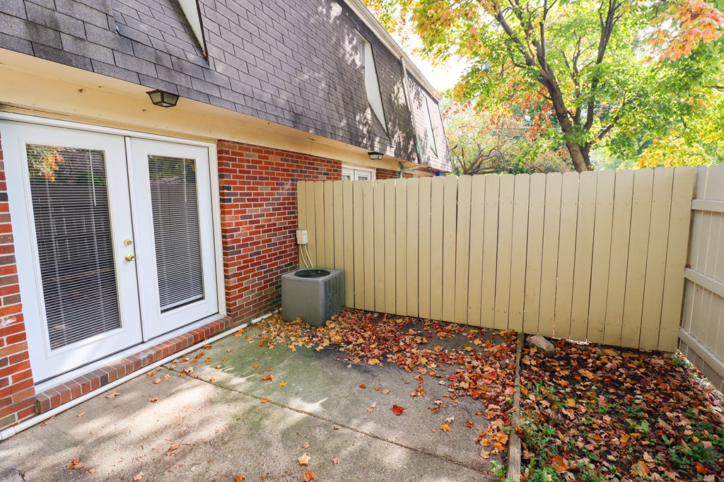 a privacy fence on the side of a house