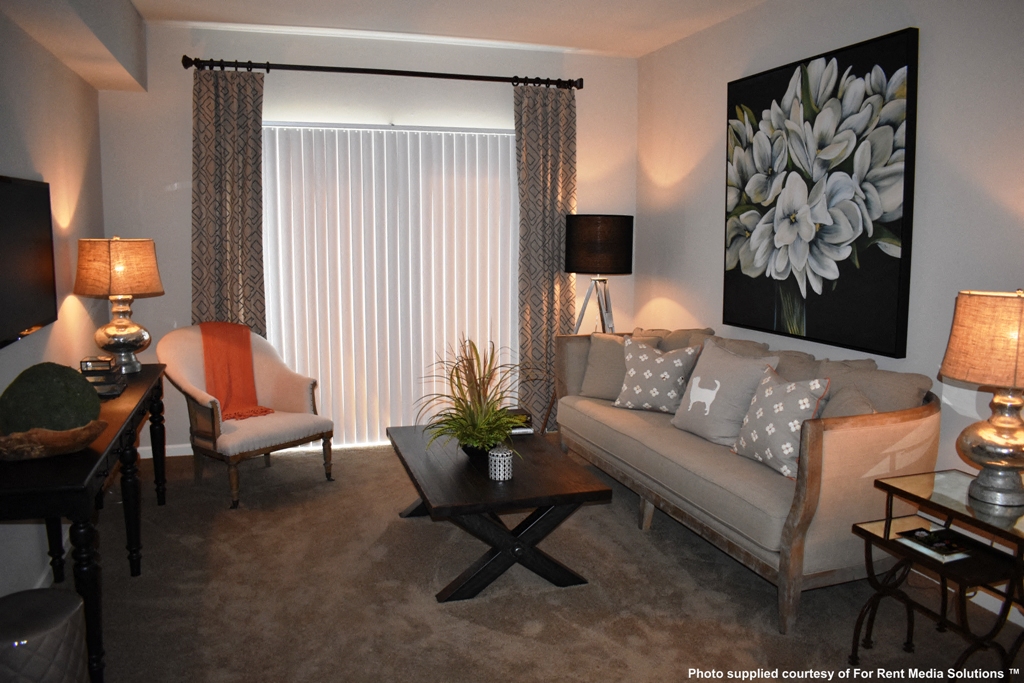 a living room with a couch and a table