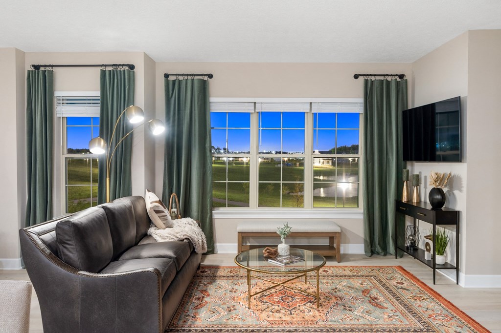 Living room at the strand at beulah townhome apartments