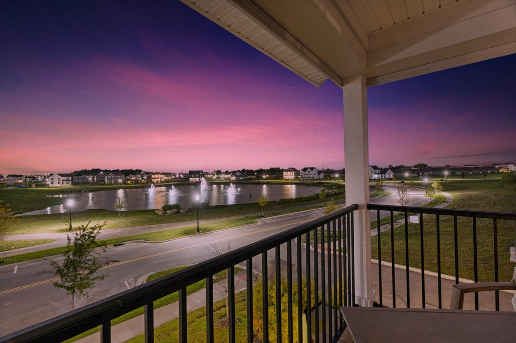 A balcony at The Strand Townhomes overlooking the pond at Beulah Park in Grove City Ohio near Columbus