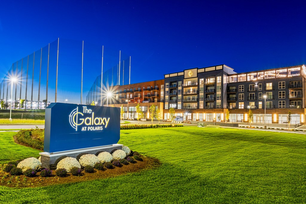 The Galaxy at Polaris hotel sign in front of the building.