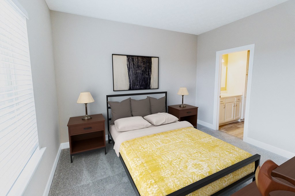 a bedroom with a bed and a dresser and a bathroom