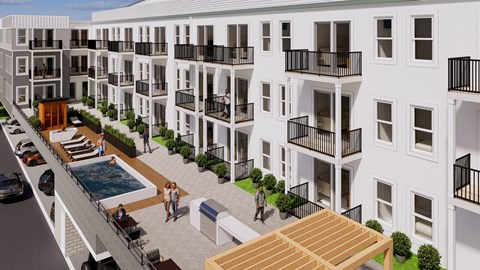 A modern apartment complex with a pool and balconies.