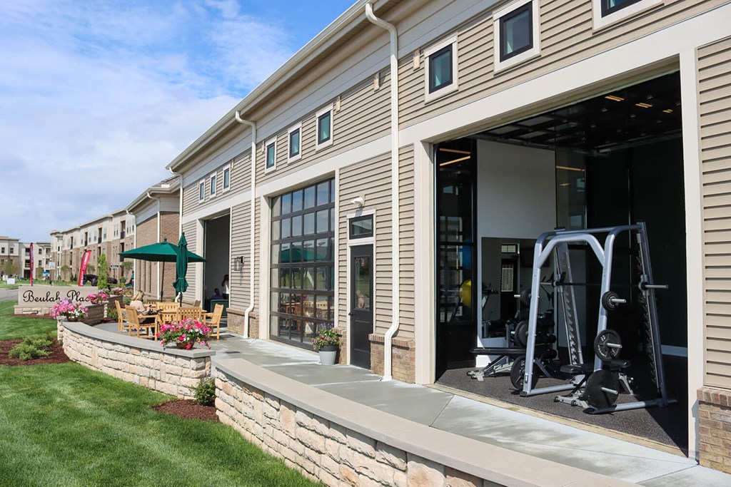 a gym is shown on the side of a building