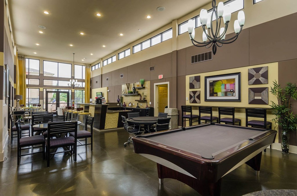 Spacious clubhouse with pool table at Ashley Collegetown in Atlanta, Georgia