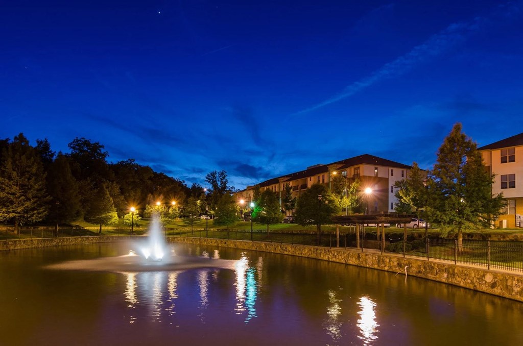 Night time view of scenic fountain and walkway at Capitol Villiage in Atlanta, Georgia