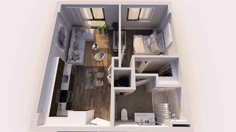A top down view of a small apartment with a kitchen, living room and bedroom.