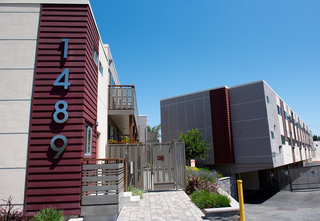 the facade of a building with a sign that reads 388 on it