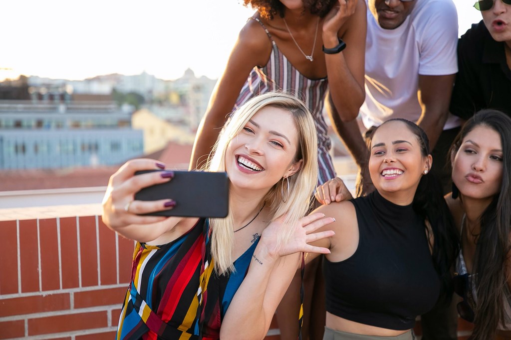 A group of friends taking a selfie together.