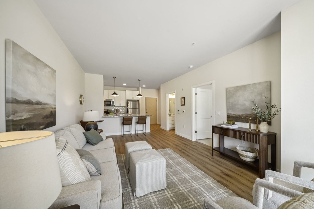 a living room with a couch and a table