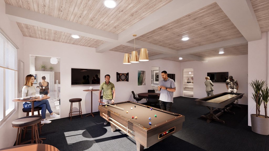 people in a living room with a pool table