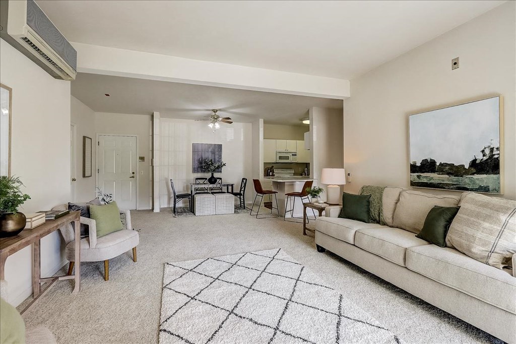 a living room with a couch and a table