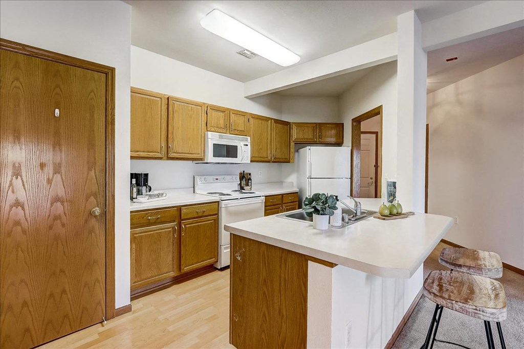 a kitchen with a counter top and a sink