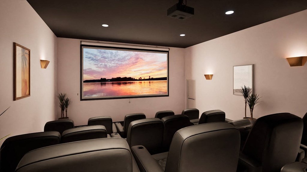 a meeting room with chairs and a projection of a sunset