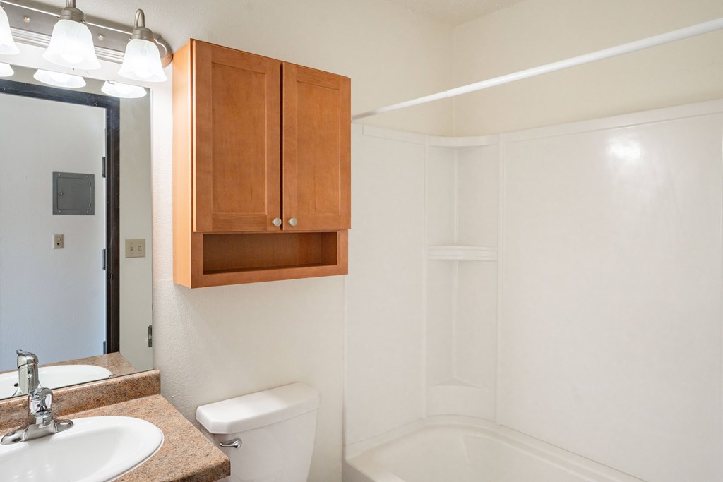 Fargo, ND Pacific Park I Apartments | 01A | Bathroom A white bathroom with a sink, toilet and bathtub. Fargo, ND Pacific Park I Apartments