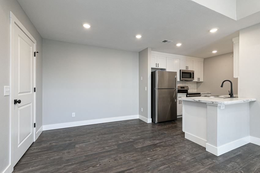 open dining room and kitchen at Quail Creek Apartments
