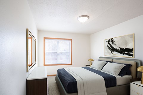 A bedroom with a bed, nightstand, and a painting on the wall. West Fargo, ND Sheyenne Terrace Townhomes