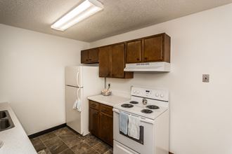 this is a photo of the kitchen of a 560 square foot, 1 bedroom apartment at as - Photo Gallery 5