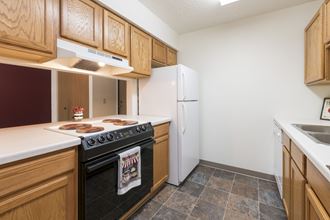 Bismarck, ND Bradbury Apartments. this is a photo of the kitchen in a 1 bedroom apartment