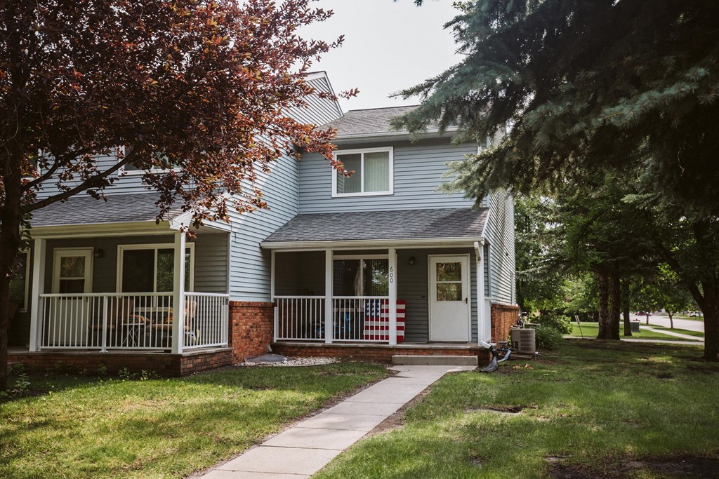 Grand Forks, ND Bristol Park Apartments.a house with a walkway in front of it