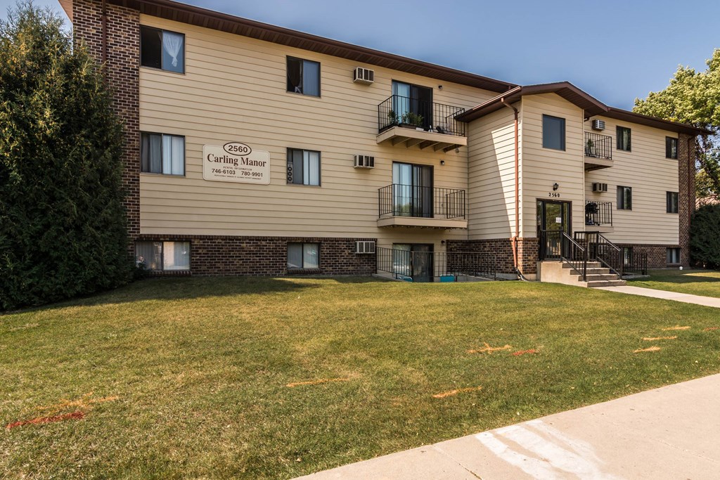Grand Forks, ND Carling Manor Apartments | Exterior Grand Forks, ND Carling Manor Apartments. this is a photo of the leasing office at Carling Manor apartments in Grand Forks, ND