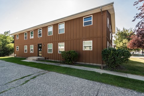 Grand Forks, ND Claremont Apartments. brick exterior of the two-level apartments building